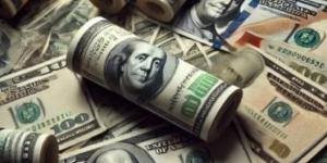 سعر صرف الدولار بالسوق الموازية يسجل قفزة كبيرة في العراق